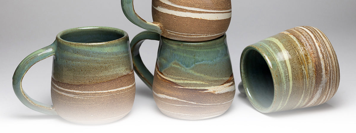 banner featuring 4 ceramic handmade mugs